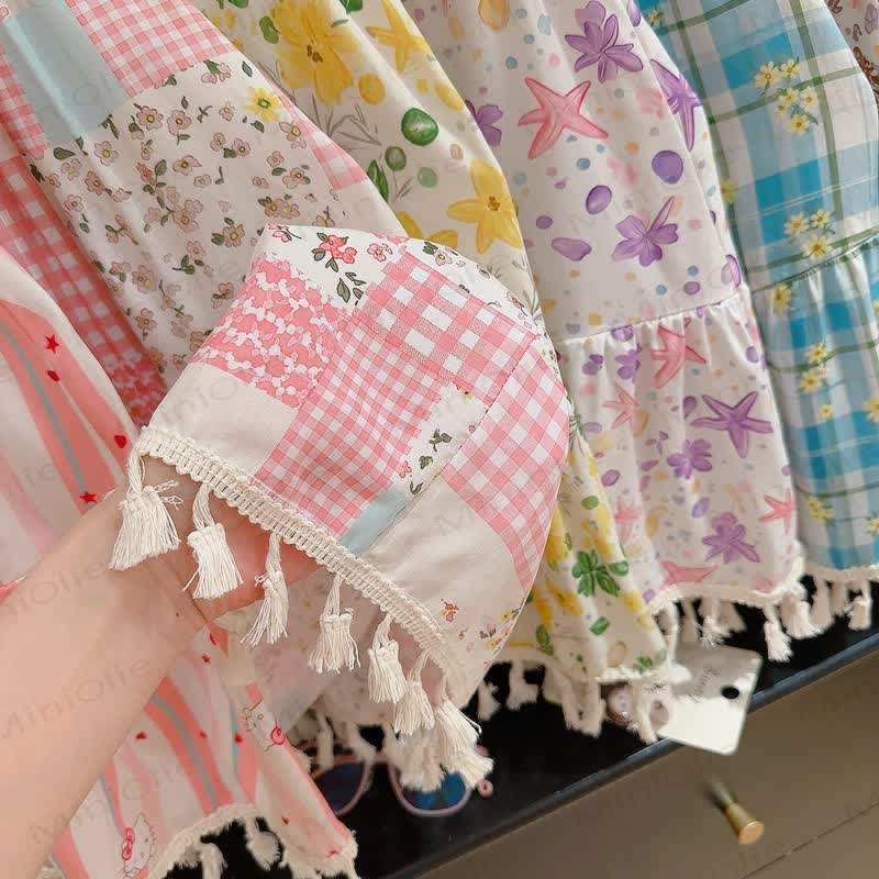 Vestito senza maniche con nappine e inserti a patchwork per bambina - image 10