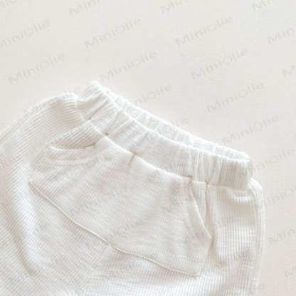 Completo per bambini composto da maglietta a nido d'ape con taschino e pantaloncini in maglia waffle con stampa orsetto. - image 7