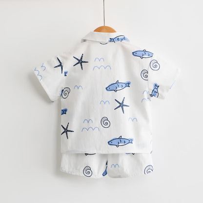Completo da bambino composto da maglietta e pantaloncini bianchi con stampa di pesci. - image 3