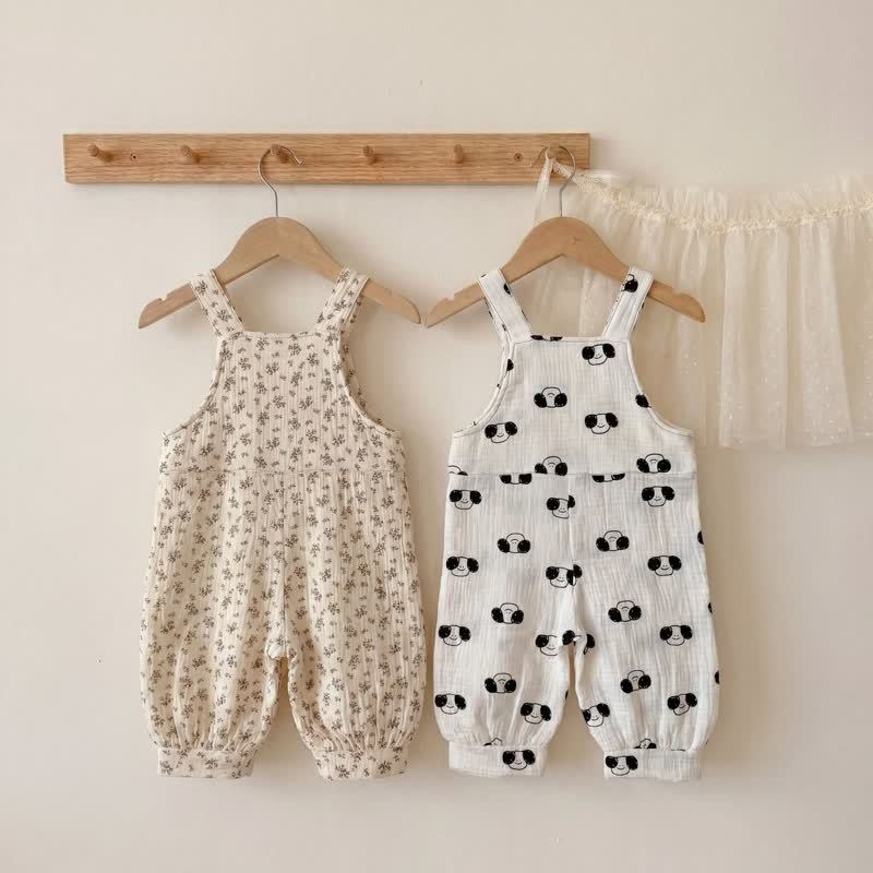 Salopette per neonati e bambini con stampa floreale/cagnolini e tasche - image 2