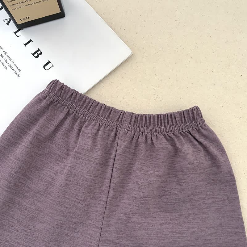 Completo pigiama da 2 pezzi per neonati e bambini piccoli, composto da canotta e pantaloncini in tinta unita. - image 10