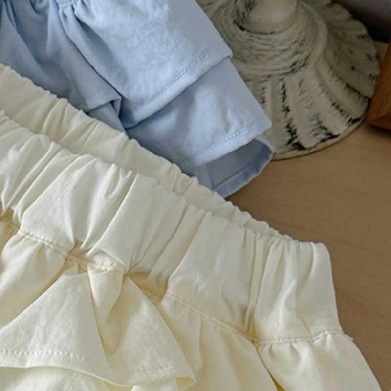 Pantaloni da bambina a tinta unita con volant in vita e coulisse. - image 7