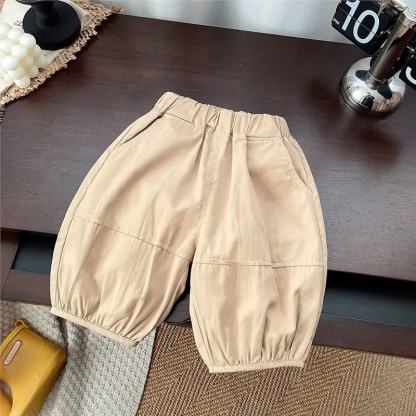 Completo da neonato composto da top a quadretti azzurri con fiocco e pantaloni beige. - image 4
