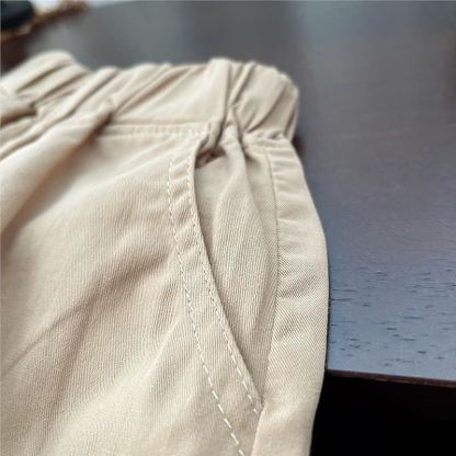 Completo da neonato composto da top a quadretti azzurri con fiocco e pantaloni beige. - image 12