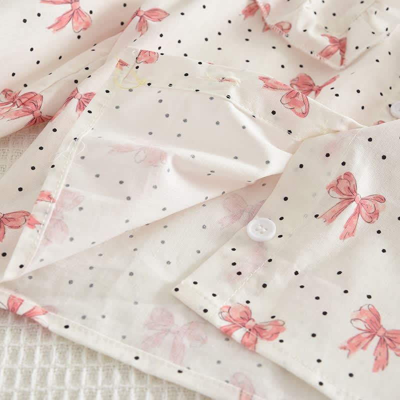 Completo da bambina composto da top e gonna bianchi e rosa con fiocco. - image 7