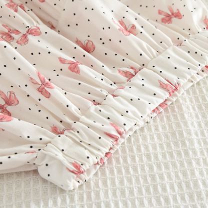 Completo da bambina composto da top e gonna bianchi e rosa con fiocco. - image 8