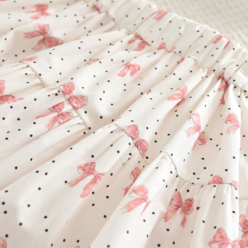 Completo da bambina composto da top e gonna bianchi e rosa con fiocco. - image 9
