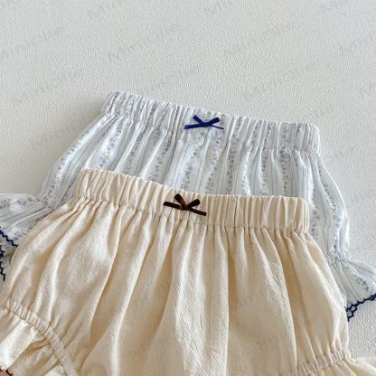 Pantaloncini in cotone a strati con fiocco e volant per bambina - image 2