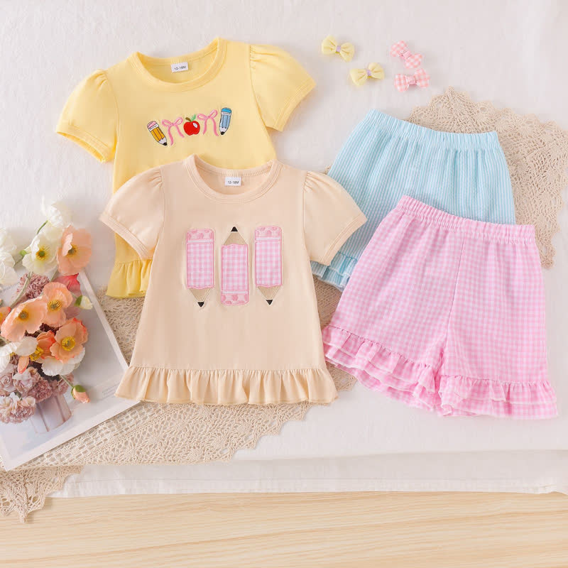 Completo da bambina composto da top a matita con applicazioni e pantaloncini, due pezzi. - image 1