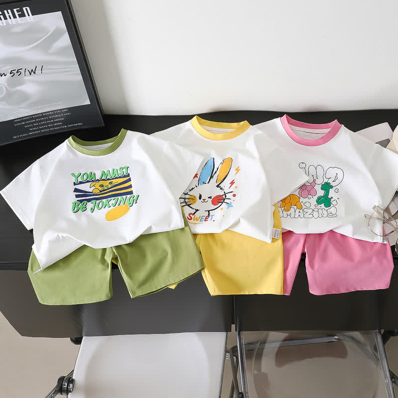 Completo da bambina composto da maglietta e pantaloncini con stampa di cartoni animati. - image 1