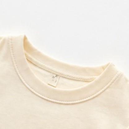 Completo da bambina composto da top senza maniche beige e pantaloni a quadretti, composto da due pezzi. - image 5