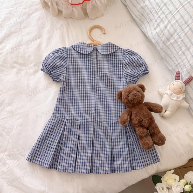 Vestitino per bambina a quadretti blu navy con maniche a sbuffo. - image 3