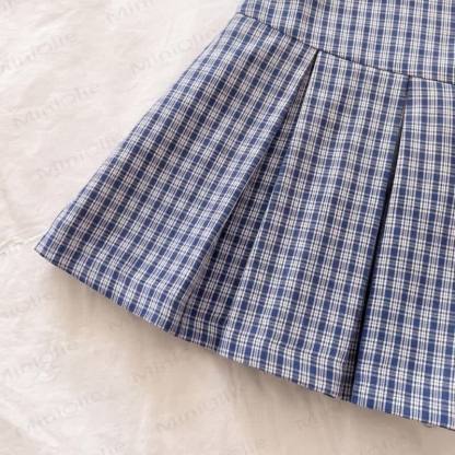 Vestitino per bambina a quadretti blu navy con maniche a sbuffo. - image 6
