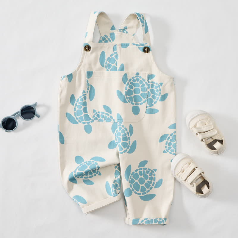 Tutina beige da neonato con tartaruga marina - image 2