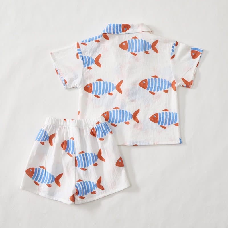 Completo da bambino composto da maglietta e pantaloncini bianchi con pesciolini. - image 3