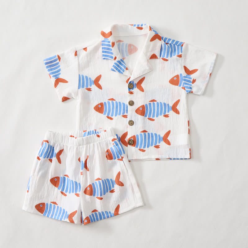 Completo da bambino composto da maglietta e pantaloncini bianchi con pesciolini. - image 2