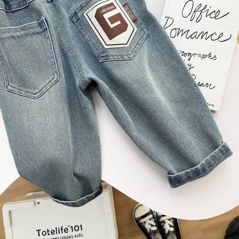 Pantaloni in denim blu vintage a vestibilità comoda per bambino. - image 5