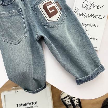 Pantaloni in denim blu vintage a vestibilità comoda per bambino. - image 5