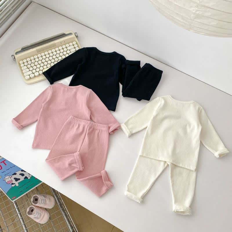 Completo da casa per bambina composto da top a maniche lunghe a coste con fiocco e pantaloni. - image 5