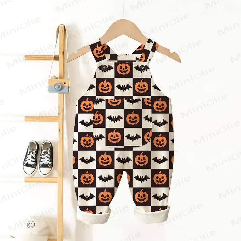 Tutina beige per neonati e bambini con stampa a scacchiera bianca e nera a tema zucca e pipistrello. - Beige - 3-5T - image 1