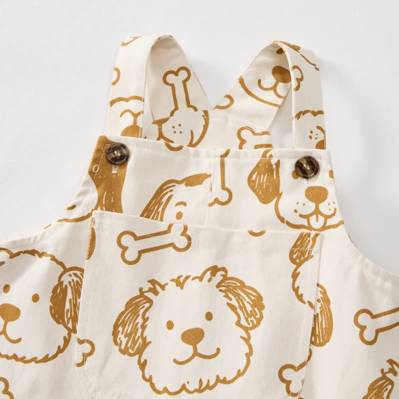 Salopette per neonati e bambini piccoli con tasca a forma di cane bianco e osso. - image 4