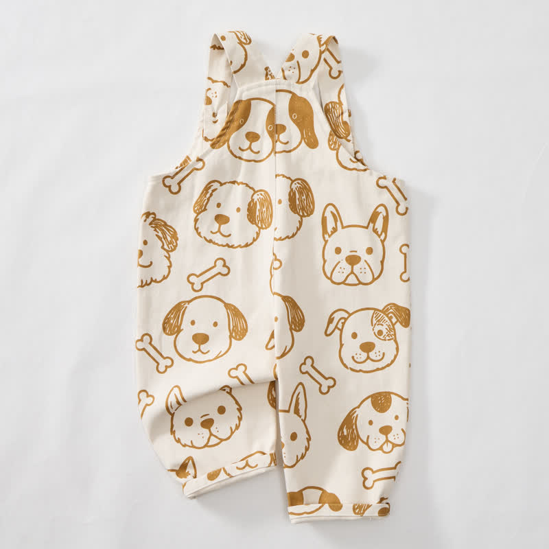 Salopette per neonati e bambini piccoli con tasca a forma di cane bianco e osso. - image 3