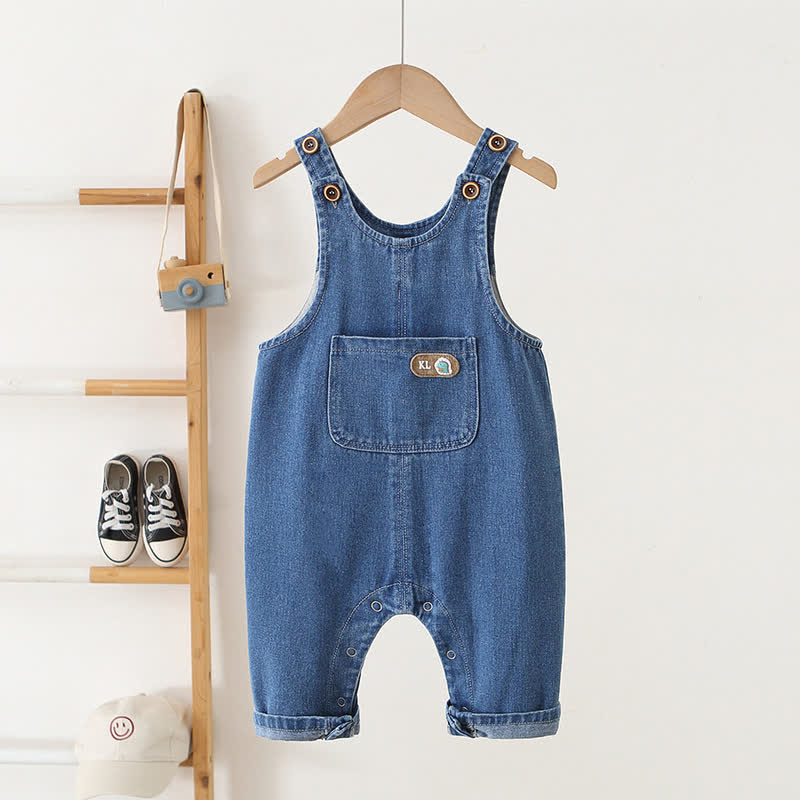 Salopette corta in denim blu per neonati e bambini piccoli con bottoni a pressione sul fondo. - Blu - 3-4 anni - image 1