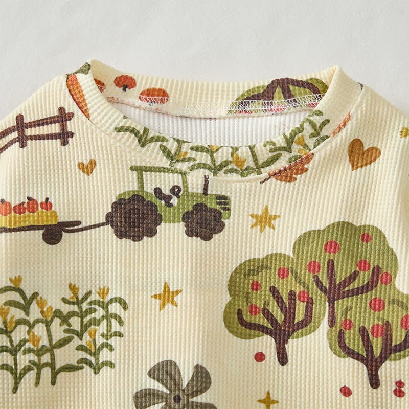 Completo da 2 pezzi con felpa a nido d'ape gialla con stampa di zucca per neonati. - image 4