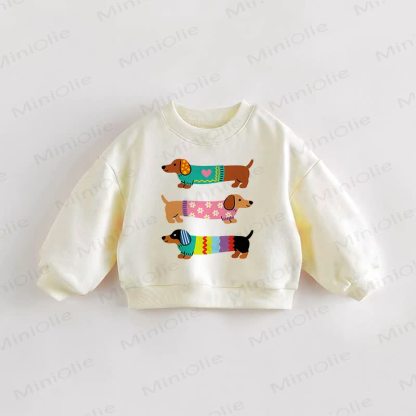 Felpa color crema con tre bassotti per neonati e bambini piccoli - Crema - 3-5T - image 1