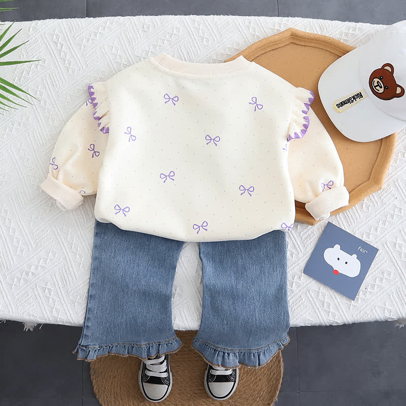 Completo da bambina composto da top in tulle con fiocco e jeans. - image 4