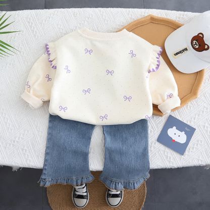 Completo da bambina composto da top in tulle con fiocco e jeans. - image 4