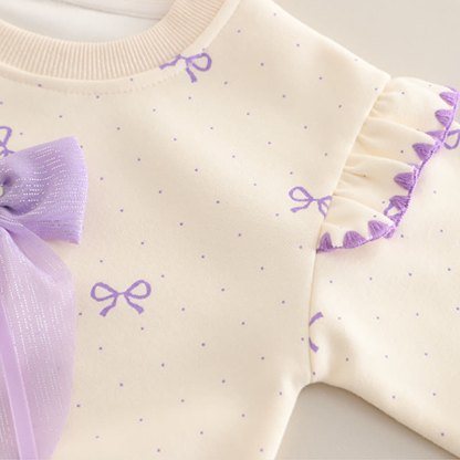 Completo da bambina composto da top in tulle con fiocco e jeans. - image 6