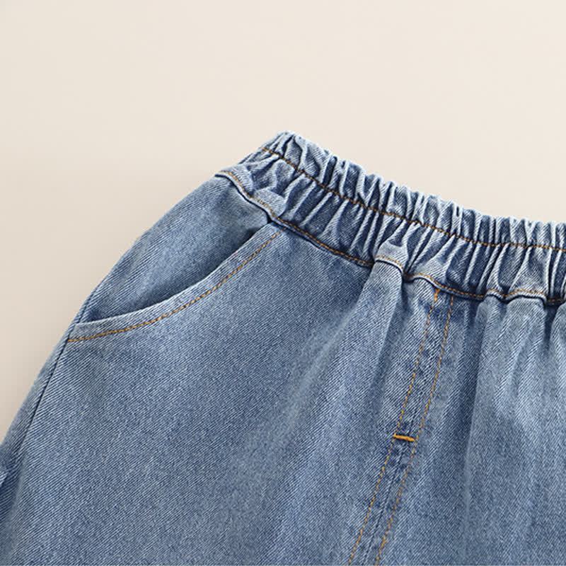 Completo da bambina composto da top in tulle con fiocco e jeans. - image 9