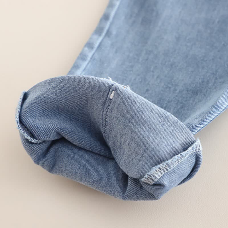 Completo da bambina composto da top in tulle con fiocco e jeans. - image 12