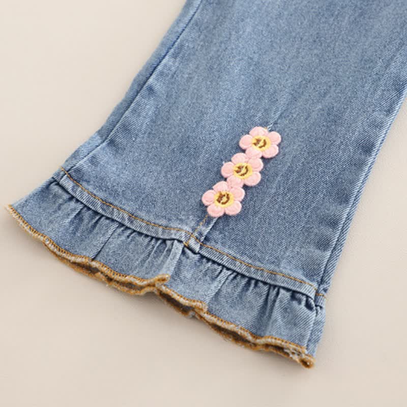 Completo da bambina composto da top in tulle con fiocco e jeans. - image 11