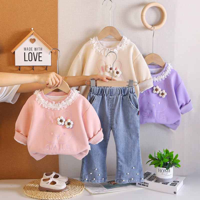 Completo 2 pezzi per bambina SMILE: top con coniglietto a fiori e pantaloni in denim. - image 1