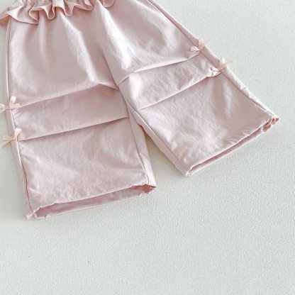 Pantaloni morbidi con fiocco e volant per bambina - image 8