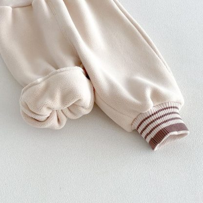 Pantaloni per neonati e bambini piccoli con elastico in vita e toppa a faccina sorridente. - image 8