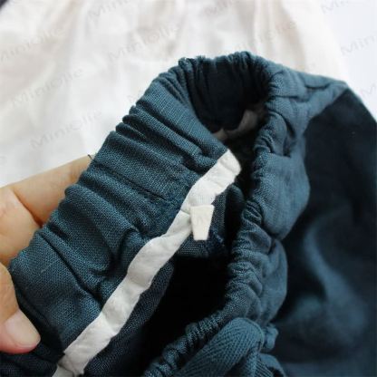 Pantaloni senza tempo neutri tinta unita per bambini - image 4