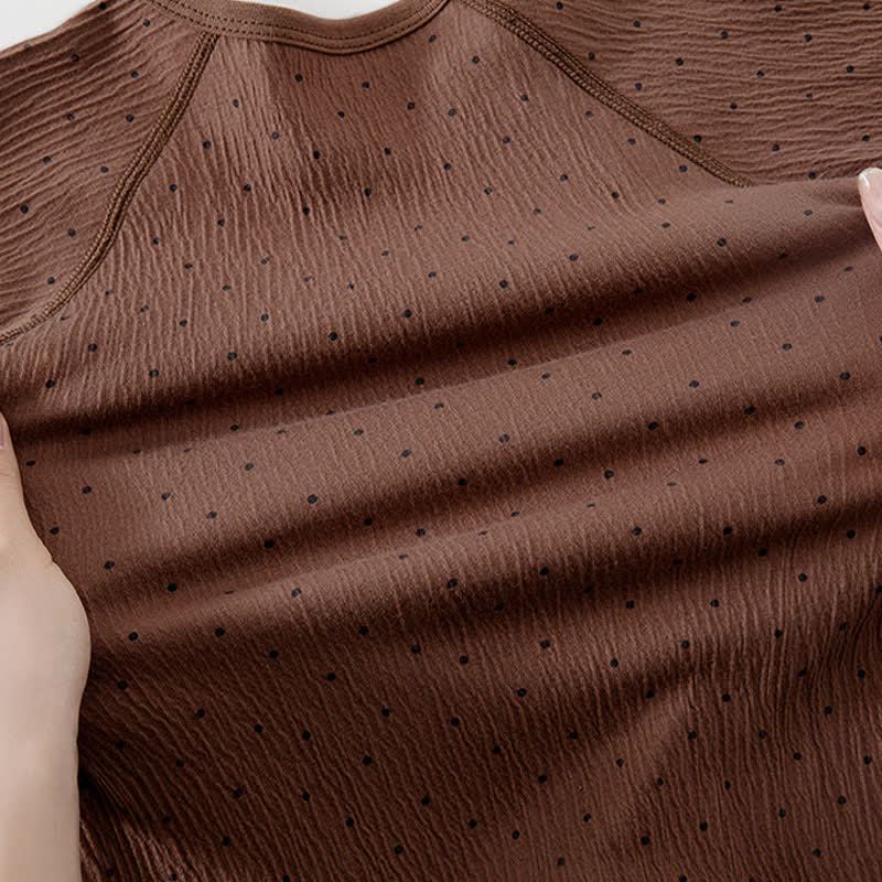 Tutina per neonati con pois e orsetto, chiusura frontale con bottoni. - image 10