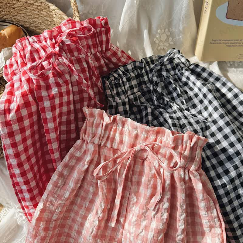 Pantaloni morbidi a quadri larghi per bambina. - image 7