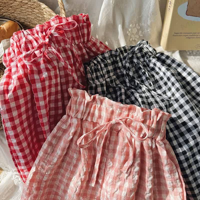 Pantaloni morbidi a quadri larghi per bambina. - image 7