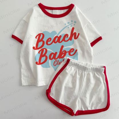 Completo 2 pezzi BEACH BABE CLUB per neonati: maglietta e pantaloncini. - Bianco e Rosso - 3-5T - image 1