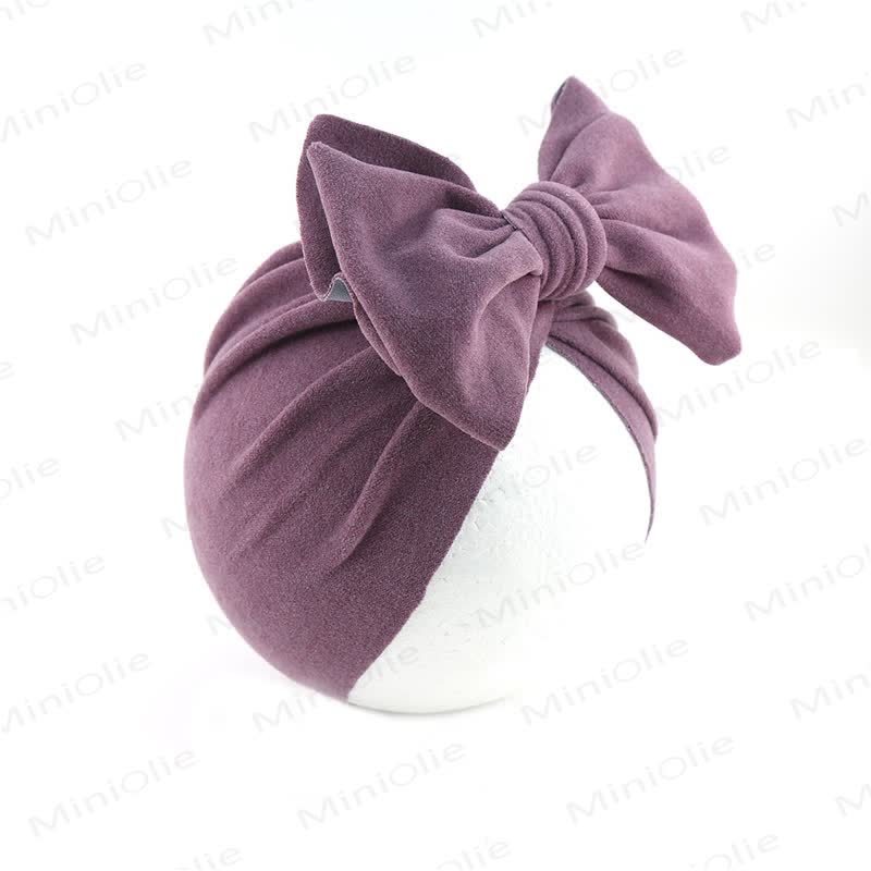 Cappello protettivo con fiocco per neonato, tinta unita - image 8