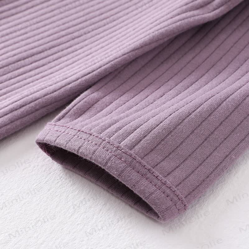 Tutina pigiama a coste tinta unita per neonati - image 5