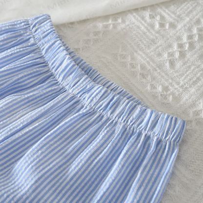 Completo da bambina composto da top blu e pantaloni a righe. - image 4