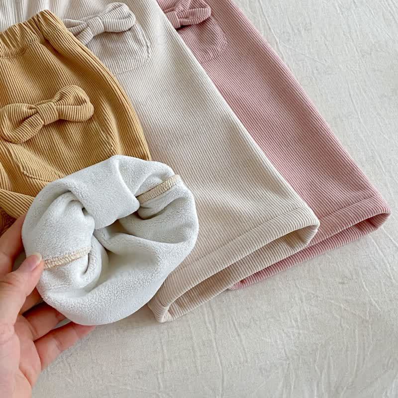 Pantaloni foderati in pile con fiocco in velluto a coste per neonati e bambine - image 9