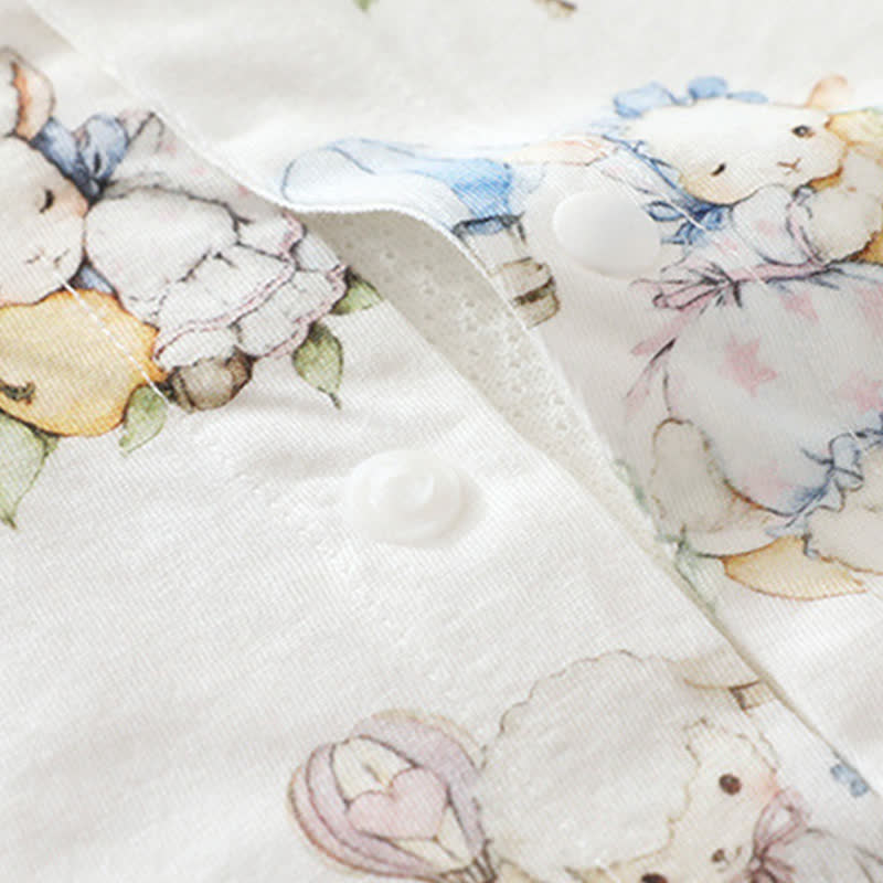 Tutina estiva per neonati con stampa giardino/oceano - image 7