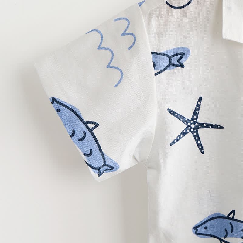 Completo da bambino composto da maglietta e pantaloncini bianchi con stampa di pesci. - image 6