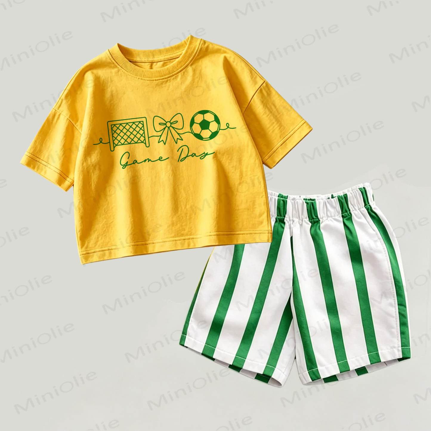 Completo da bambina "GAME DAY" composto da top giallo e verde e pantaloncini a righe, due pezzi. - Giallo e verde - 2-3T - image 1